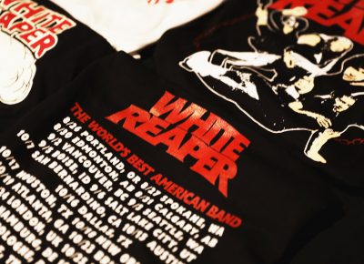 White Reaper merchandise, including T-shirts featuring their newest album. Photo: Lmsorenson.net