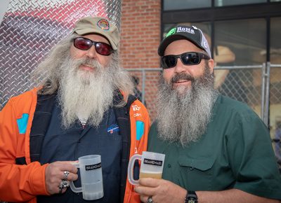 (L-R) Scott and David Ruster dropped tokens for Uinta Brewing Company’s Test Phaze IPA. Photo: John Barkiple
