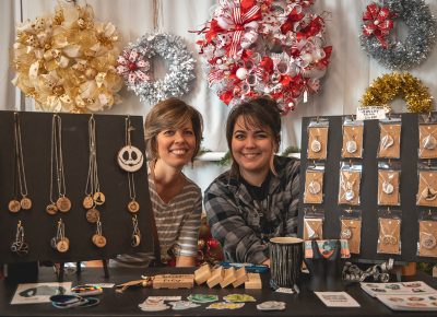 Mother and daughter crafting and vending together.