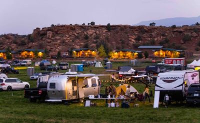 Fort Desolation Fest campers spread across the Torrey, Utah, landscape.