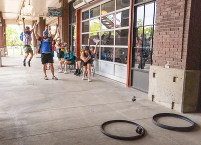Another win for Grant — this time in the tube toss at Bingham Cyclery on Broadway. Looks like Molly’s tube toss fell just short of the tire. Photo: TaCara DeTevis.
