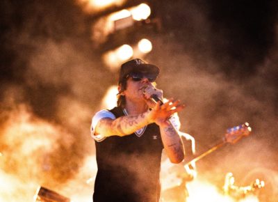 Matt Shultz singing on stage towards the audience in a layer of smoke in Salt Lake City. Photo: @lmsorenson