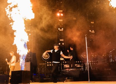Cage the Elephant’s Matt Shultz playing around, dancing around the fire as the music plays. Photo: @lmsorenson