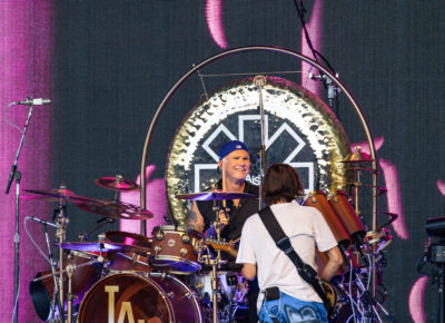 Drummer Chad Smith gives guitarist John Frusciante a smile as they begin to play a new song while on stage with the Red Hot Chili Peppers in Salt Lake City, Utah. Photo: @lmsorenson
