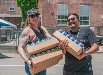 The Ogden Beer Company crew picks up a few cases of brew ready to pour to all festival attendees. Photo: Talyn Behzad.