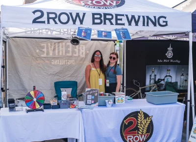 (Left to right, Tamara and Kelly) 2Row from Midvale had a fun spin wheel with prizes and good beers to try out. Photo: Chay Mosqueda.