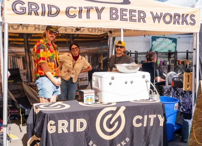 (Left to right, Jordan, Lucie, Tim) A personal favorite of many people in the SLC area, Grid City has great beer and wicked employee outfits. Photo: Chay Mosqueda.