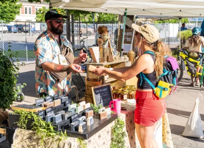 Chris from Hive Mind Apiary sells local honey products and soap. Photo: Chay Mosqueda.