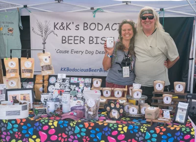 Amy and Dennis from K & K Bodacious Beer Biscuits have hearts made of gold. Their treats are perfect for your pup and they work with the local community shelters to find homes for dogs. Photo: Chay Mosqueda.