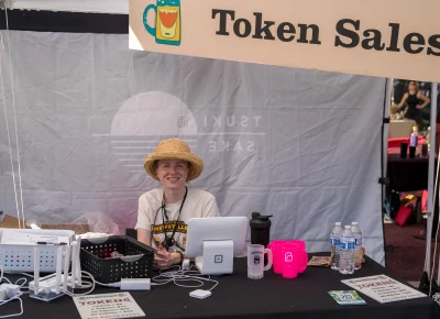 Gabriel volunteered and sold the best thing to buy at Brewstillery, drink tokens! Photo: Chay Mosqueda.