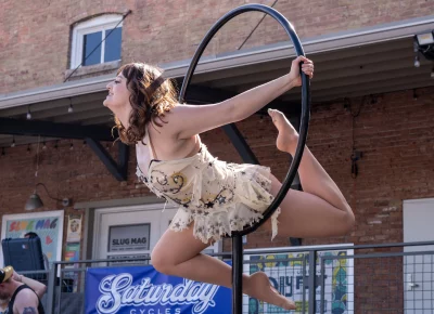 Heather of Starfall Circus has heads spinning with her stunning performance. Photo: Brayden Salisbury.