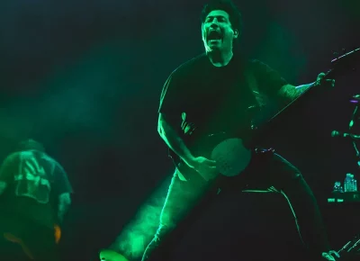 Pierce The Veil's lighting emphasizes their signature emo sound.