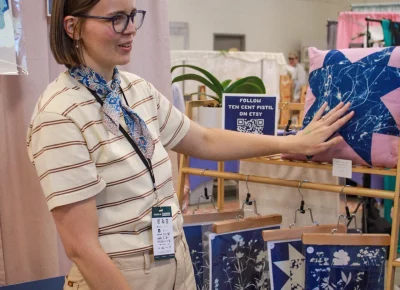 Ten Cent Pistil shows off her cyanotype prints. Photo: Hayley Stoddard.