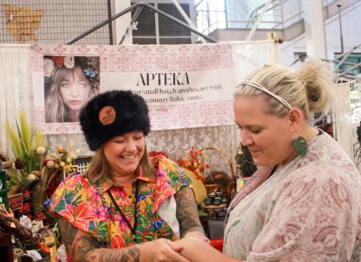 Apteka connects with a customer. Photo: Hayley Stoddard.