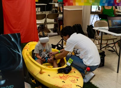 Kids get an immersive VR experience in the STEM building. Photo: Dominic Jordon.