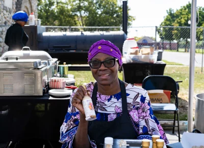 Friendly food vendors encourage attendees to stop by for a bite. Photo: Dominic Jordon.