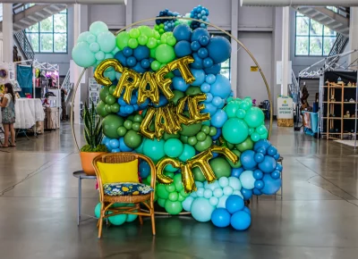 A balloon sculpture welcomes attendees to the festival. Photo: Derek Brad.