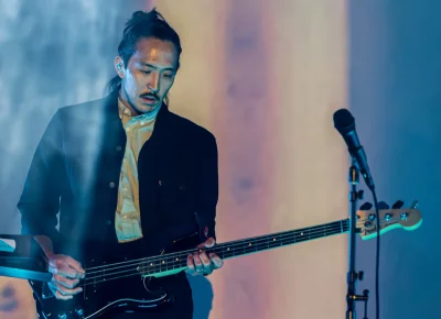 Billy Kim adds layers of depth to Tycho's sound. Photo: Derek Brad.