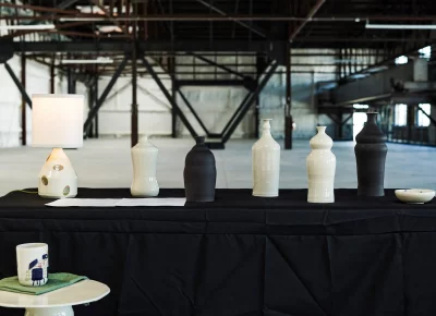 The Olive Lamp, Ceramic End Table and Bottleneck Vase Collection by Molly Wireman.