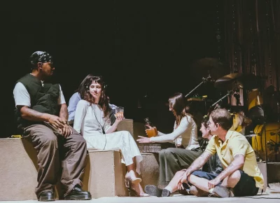 Clairo and her band shared a drink before their set.