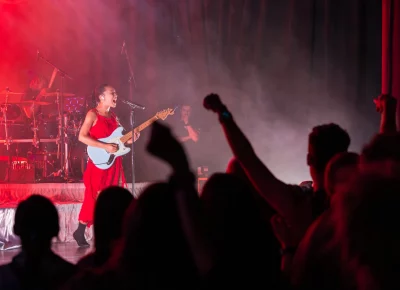 Griff brings out the electric guitar for part of her performance. Photo: Derek Brad.