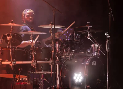 Griff's drummer holds it down throughout the set. Photo: Derek Brad.