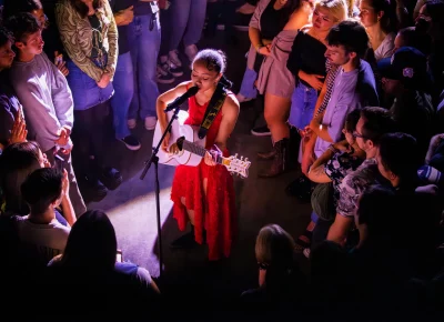 The crowd is fully invested in Griff's acoustic performance. Photo: Derek Brad.