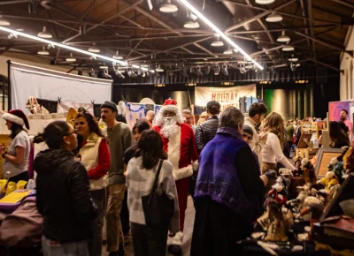 Santa is quite popular at Holiday Market. Photo: Derek Brad.