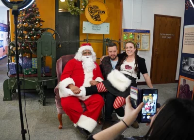 What better way to celebrate than a photo with Santa? Photo: Evan Hancock.