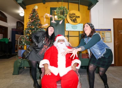 Photos with Santa are fun for kids and adults alike. Photo: John Barkiple.