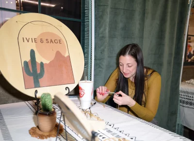 Ivie & Sage is hard at work crafting jewelry. Photo: John Barkiple.