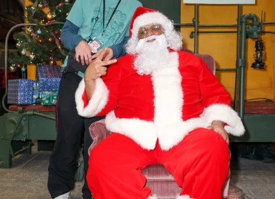 Craft Lake City volunteers need pics with Santa, too. Photo: John Barkiple.