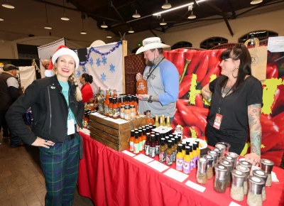 Angela H. Brown smiles for great local hot sauce. Photo: John Barkiple.