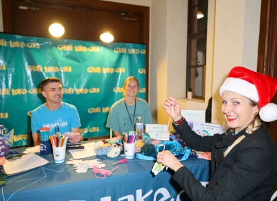 Angela H. Brown enjoys the crafts at the CLC booth. Photo: John Barkiple.