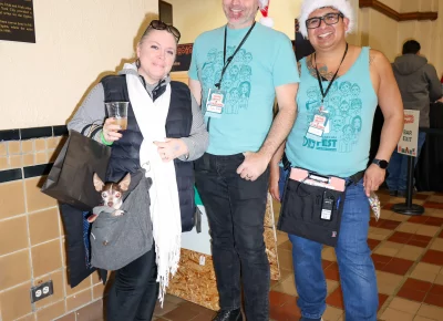 John Ford's wife and chihuahua join him and Sergio Hernandez at Holiday Market. Photo: John Barkiple.